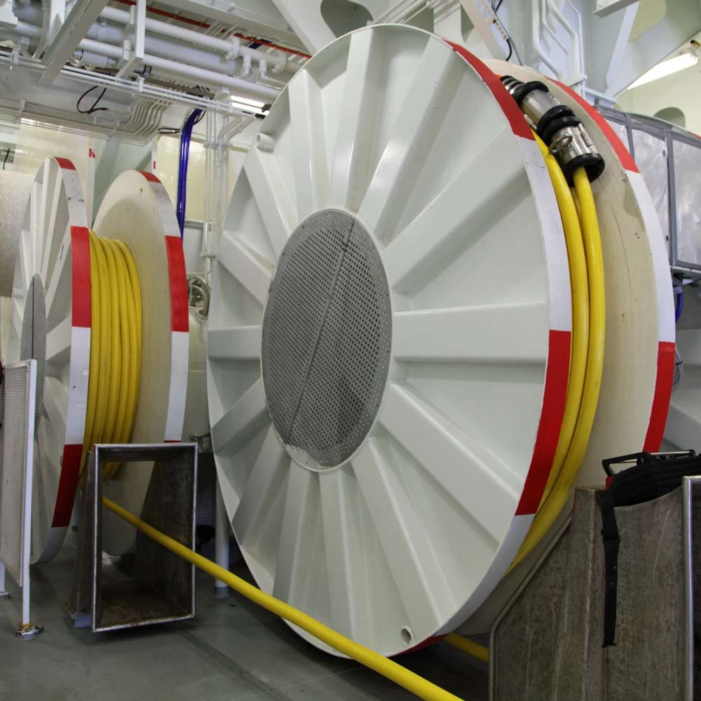 Cable reel system for flexible reeling and automated motion applications
