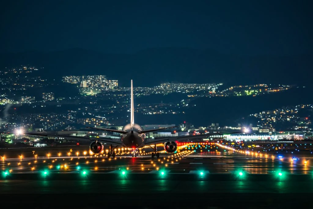 Airport runway lighting at night supported by airfield primary circuit infrastructure