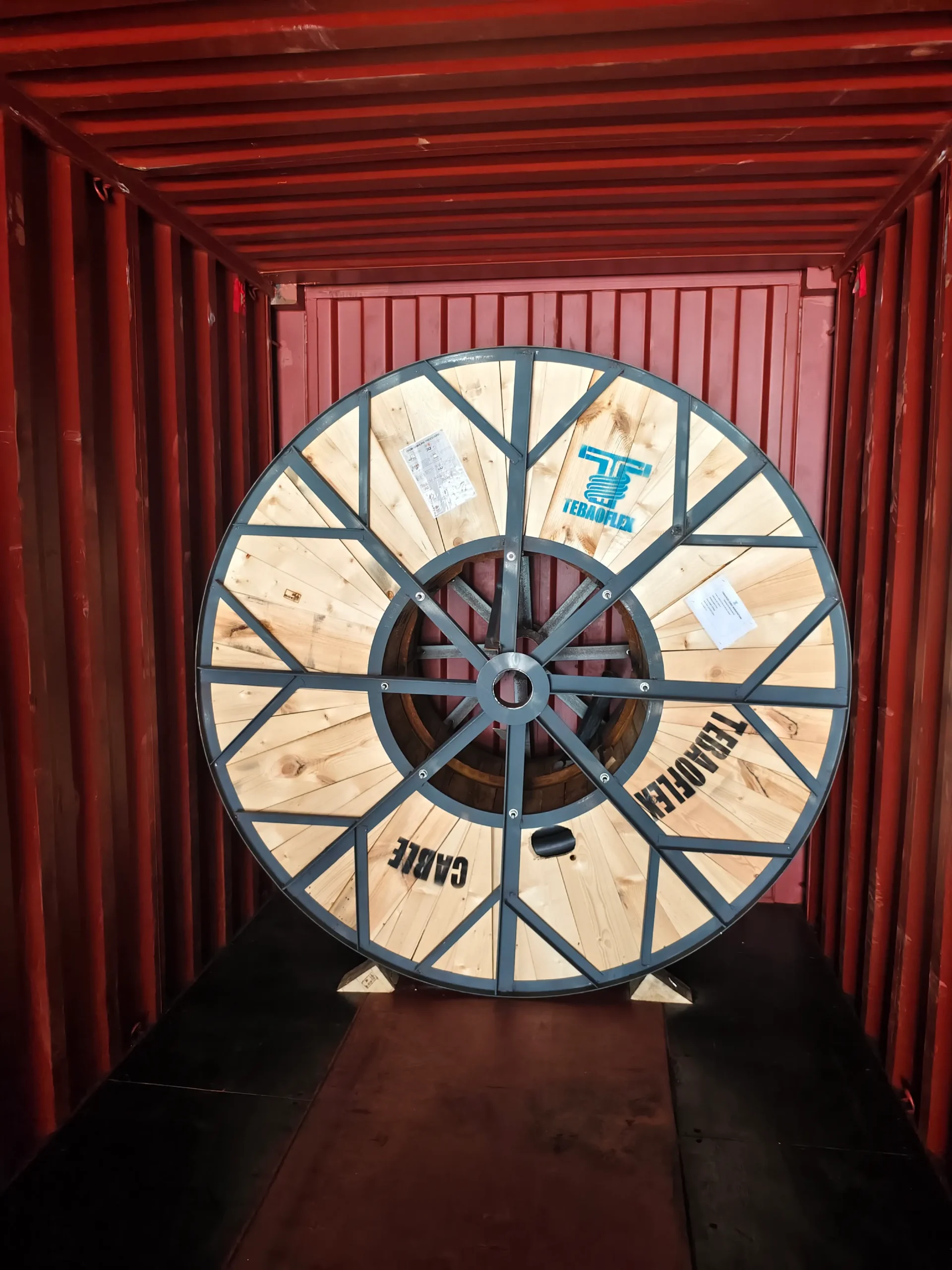 TEBAOFLEX cable reel secured inside an export shipping container