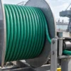 TEBAOFLEX TBPUR-RF 0.6/1kV green PUR reeling cable installed on a single-layer monospiral crane reel