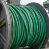TEBAOFLEX TBPUR-RF 0.6/1kV green heavy-duty PUR reeling cable operating on an industrial random-winding drum reel
