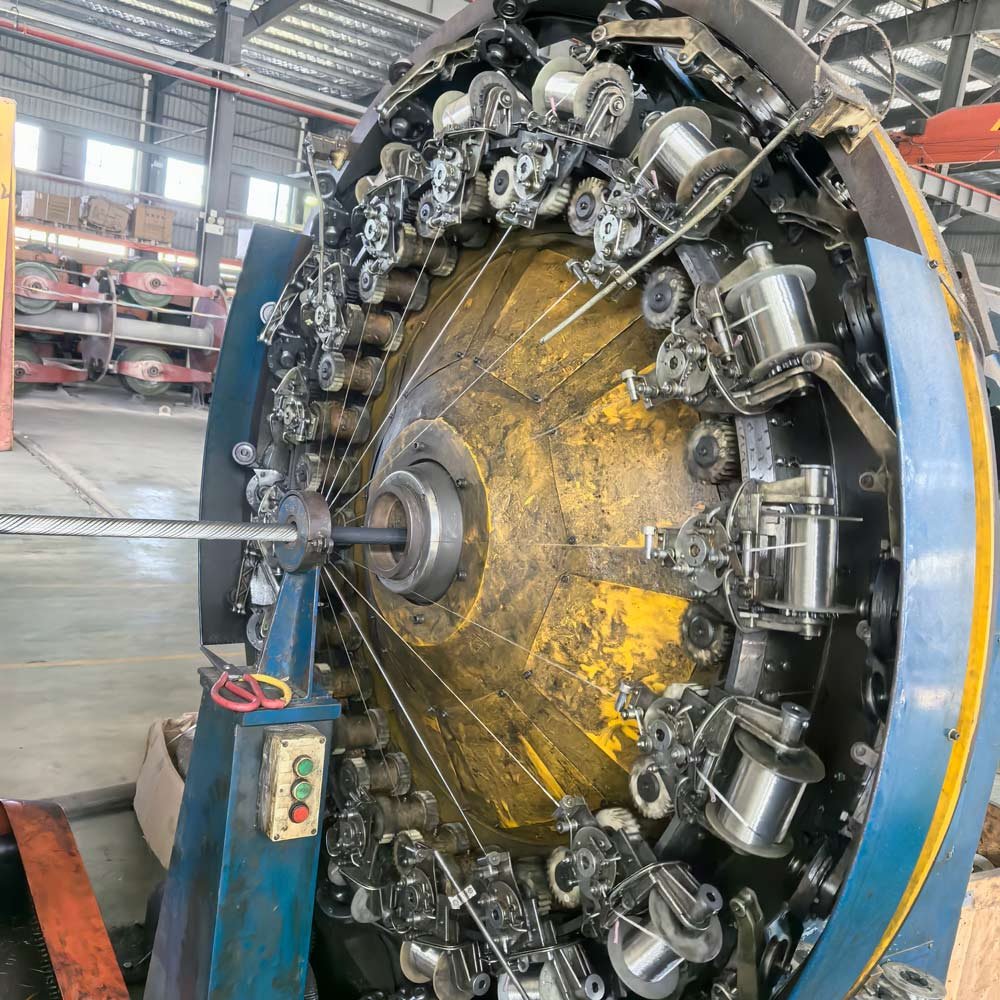 TEBAOFLEX cable manufacturing machine performing steel wire braiding