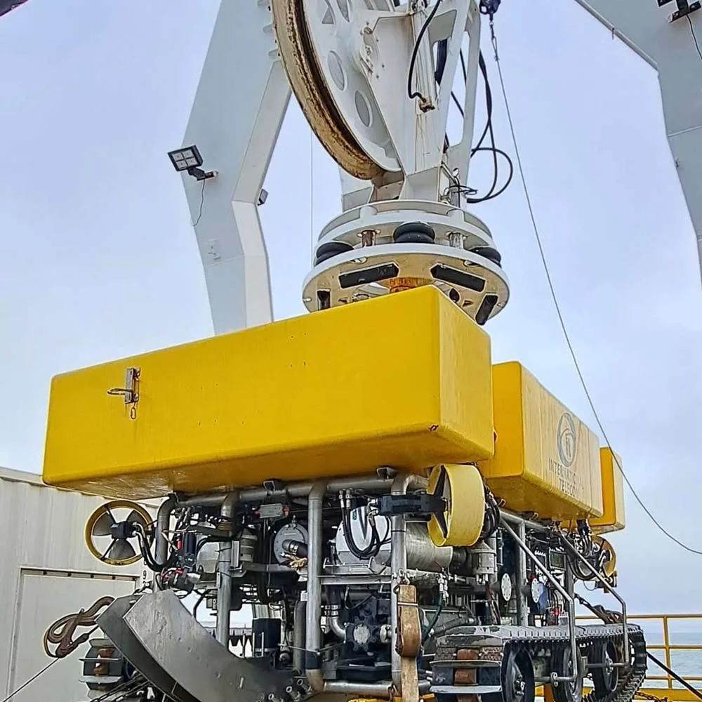 Subsea survey equipment deployed from a vessel using a cable handling system