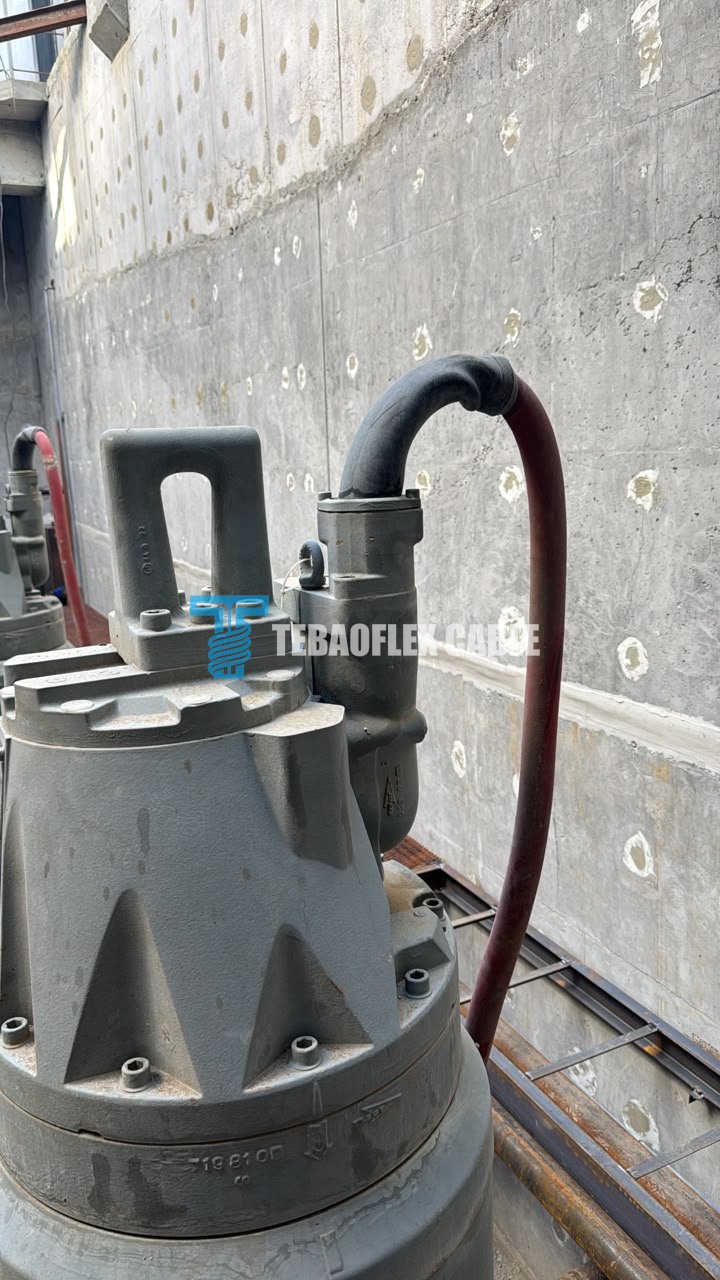 Industrial submersible pump with an existing red medium-voltage cable at the Kazakhstan project site