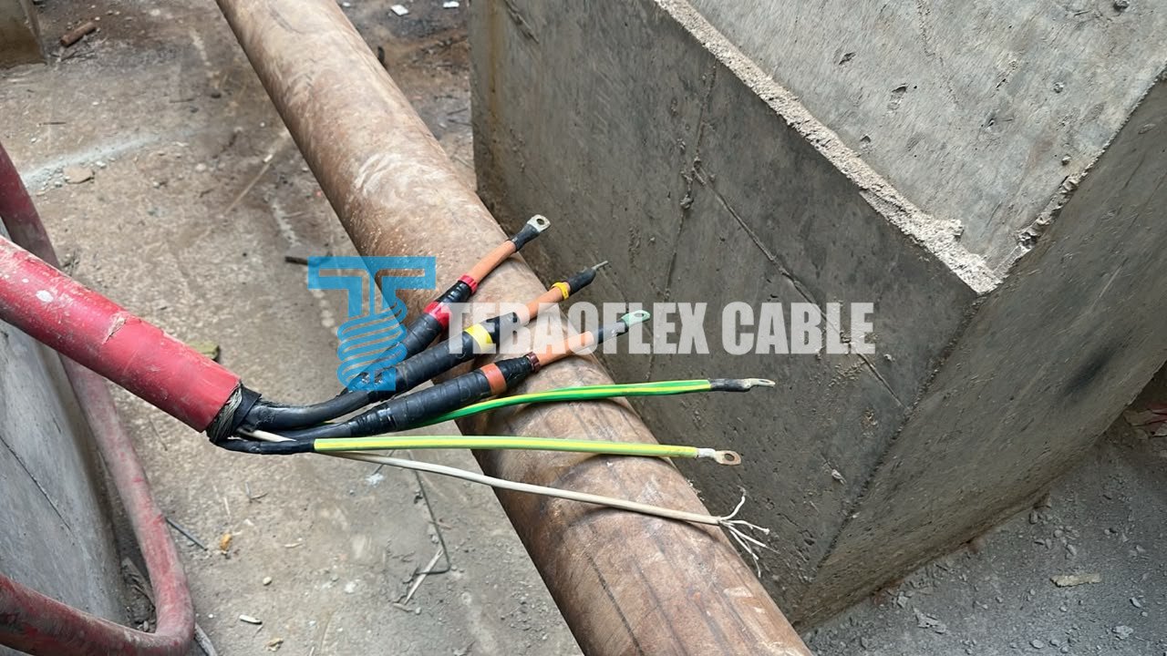Existing pump cable with separated power, earth and control conductors prepared for inspection