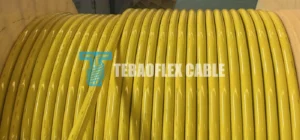 Yellow PUR 400 Hz aircraft ground power cable wound on a wooden factory drum for a Russia civil airport PIT inquiry