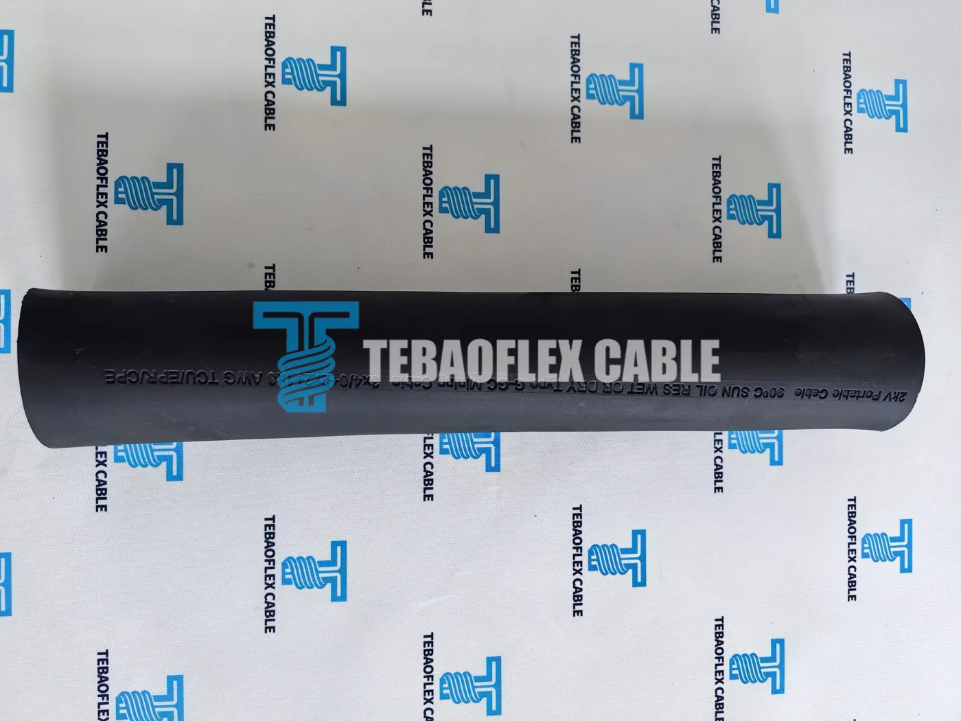 Black CPE outer jacket marking on TEBAOFLEX 2 kV Type G-GC 3x4/0+2x2+1x8 AWG portable mining cable sample