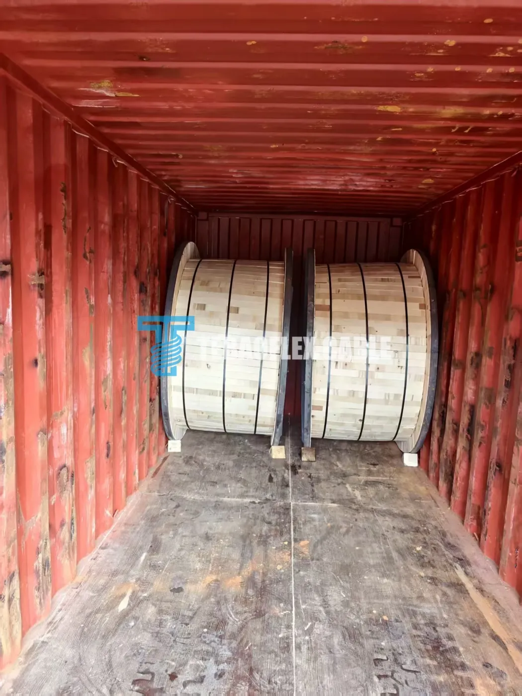 Export wooden mining cable reels loaded and braced inside ocean freight container